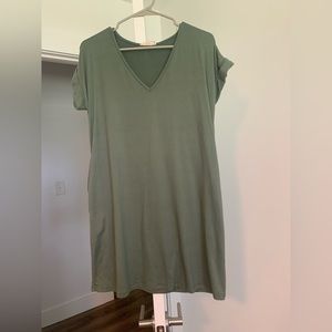 Green T-Shirt dress with pockets. Size small.
